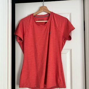 Xcel women’s athletic shirt. Size M.